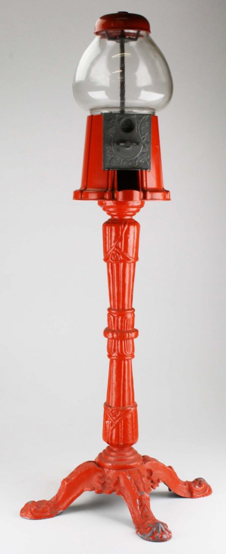 1970's orange cast metal and glass globe gumball (1 of 3)