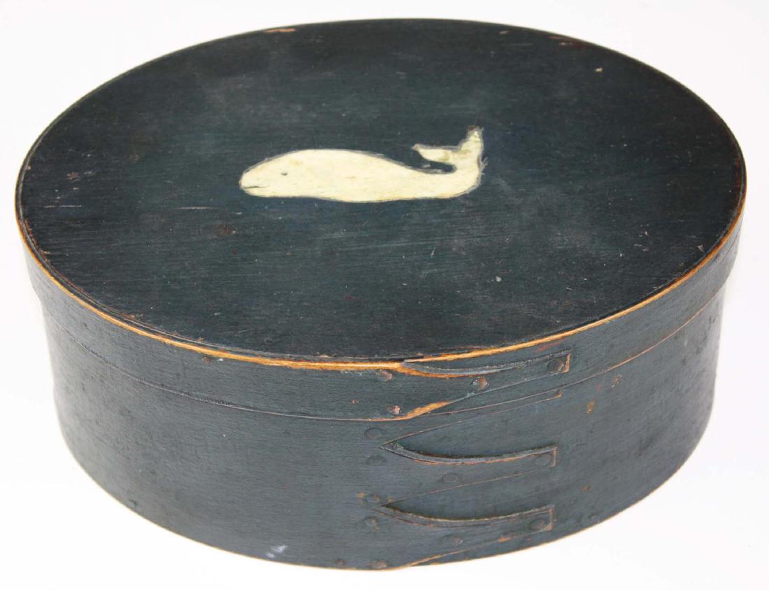19th c Shaker oval box in old green paint w/ sperm: whalebone inset in top of lid, 3 fingers, length 8 3/4 inches, ht 3 3/4 inches