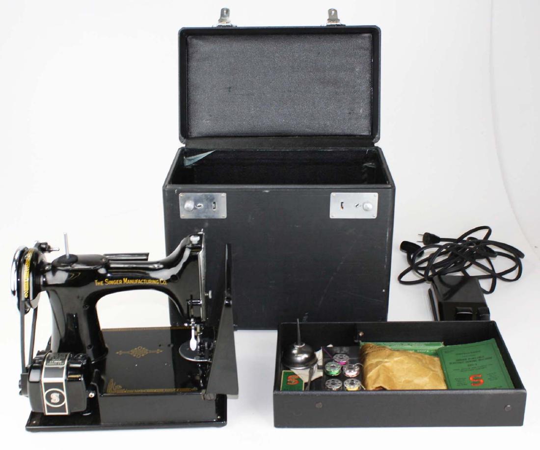 Singer featherweight sewing machine: with case & accessories