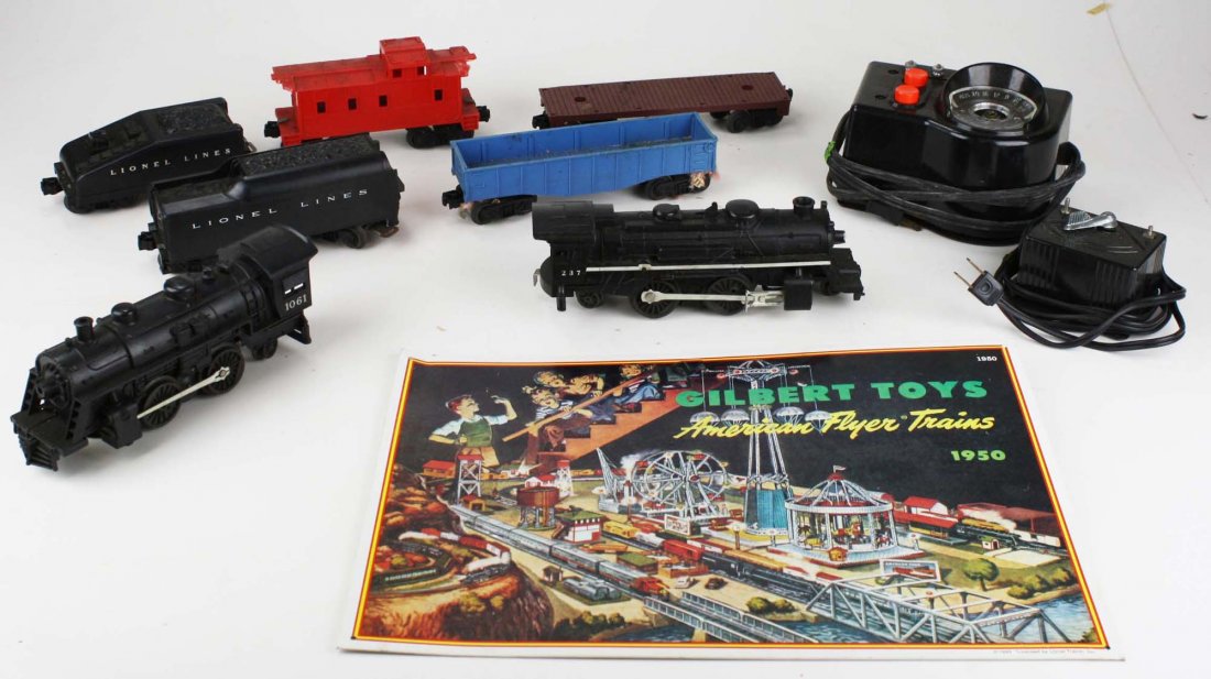 Lionel trains and Gilbert sign.: Lionel trains and Gilbert sign. O gauge Lionel 237 engine and 1061 engine post WW II with various cars. Gilbert Toys 1950 tin litho sign for American flyer.