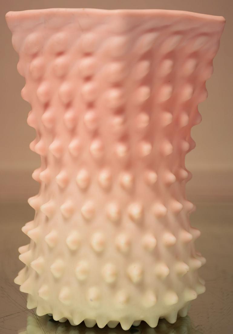 Amer. Victorian Burmese Hobnail Blown Glass Vase: An antique, Victorian Burmese glass vase with a traditional opaque, satin finish shading from pink to custard yellow. It has a pentagonal opening with a round base and overall hobnail surface. Burmese