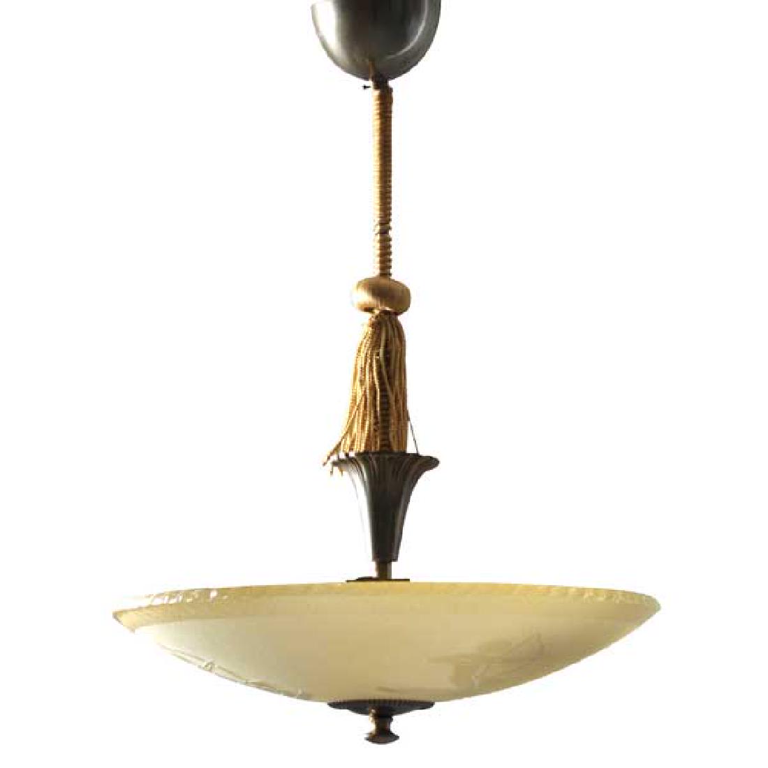 Swedish Art Deco Bronze and Glass Ceiling Light: This Scandinavian Art Deco period light fixture features a thick, amber glass bowl encircled with three etched classical, nude archers. DATE c. 1930 DIMENSIONS Width 16 Depth 16 Height 22 in. CONDITIO