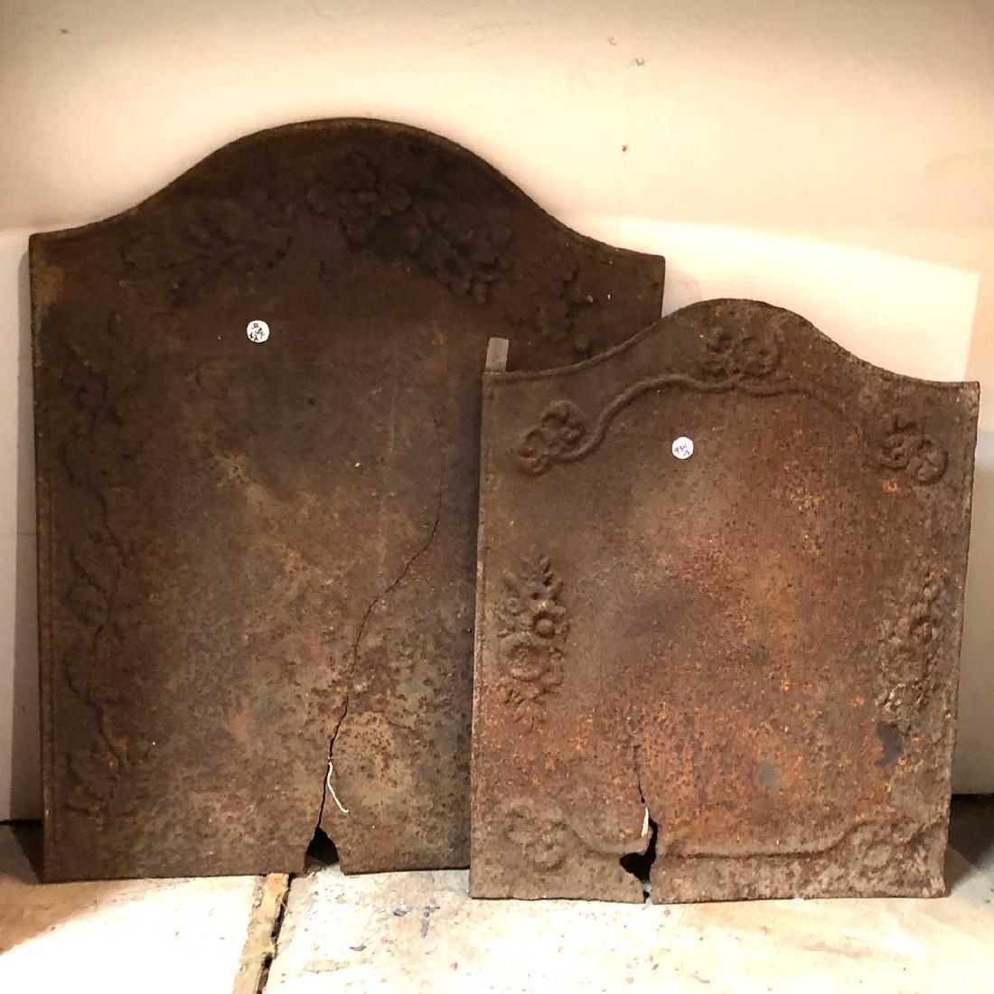 2 French Cast Iron Fireplace Firebacks: DATE c. 1850 DIMENSIONS (1) Width 22 Height 27 in. (1) Width 18 Height 22 in.CONDITION Note: cracked.