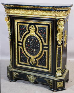 French Louis XIV Syle Side Cabinet: French Louis XIV style side cabinet with bronze ormolu decoration on all sides. Cherubs mounted on corners.Dimensions: 47"t x 17"d x 42"wDate: Ca. 1800