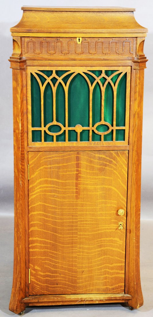 Edison Oak Tall Chippendale Model C250 Phonograph: Disc phonograph with two drawers in base full of records. Condition: excellent condition, complete and in good working order Dimensions: 51"t x 22 1/2"d x 22"w Date: Ca. 1910