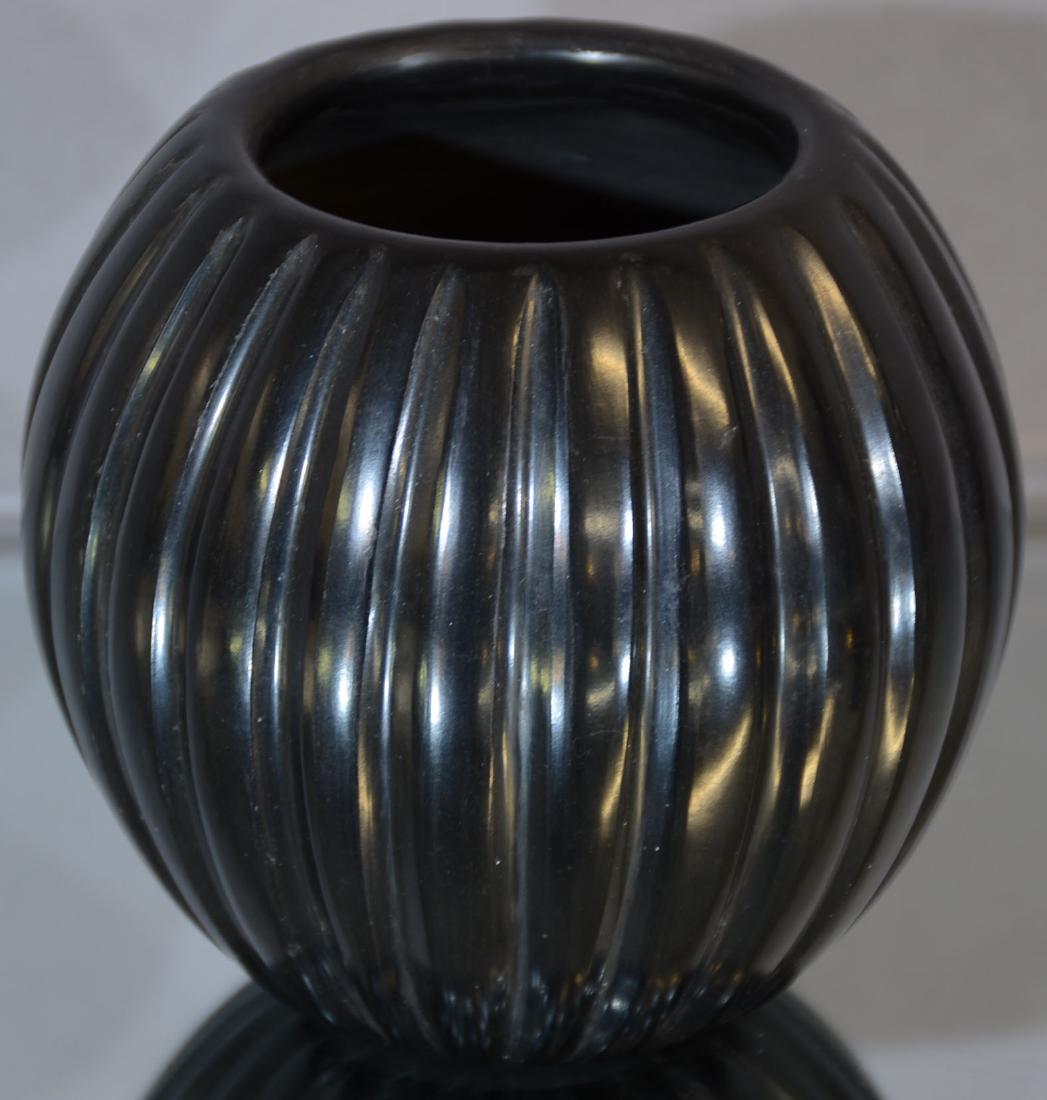 Angela Baca Santa Clara Pueblo Melon Jar: Dimensions: 4" x 4" Date: ca. 1955