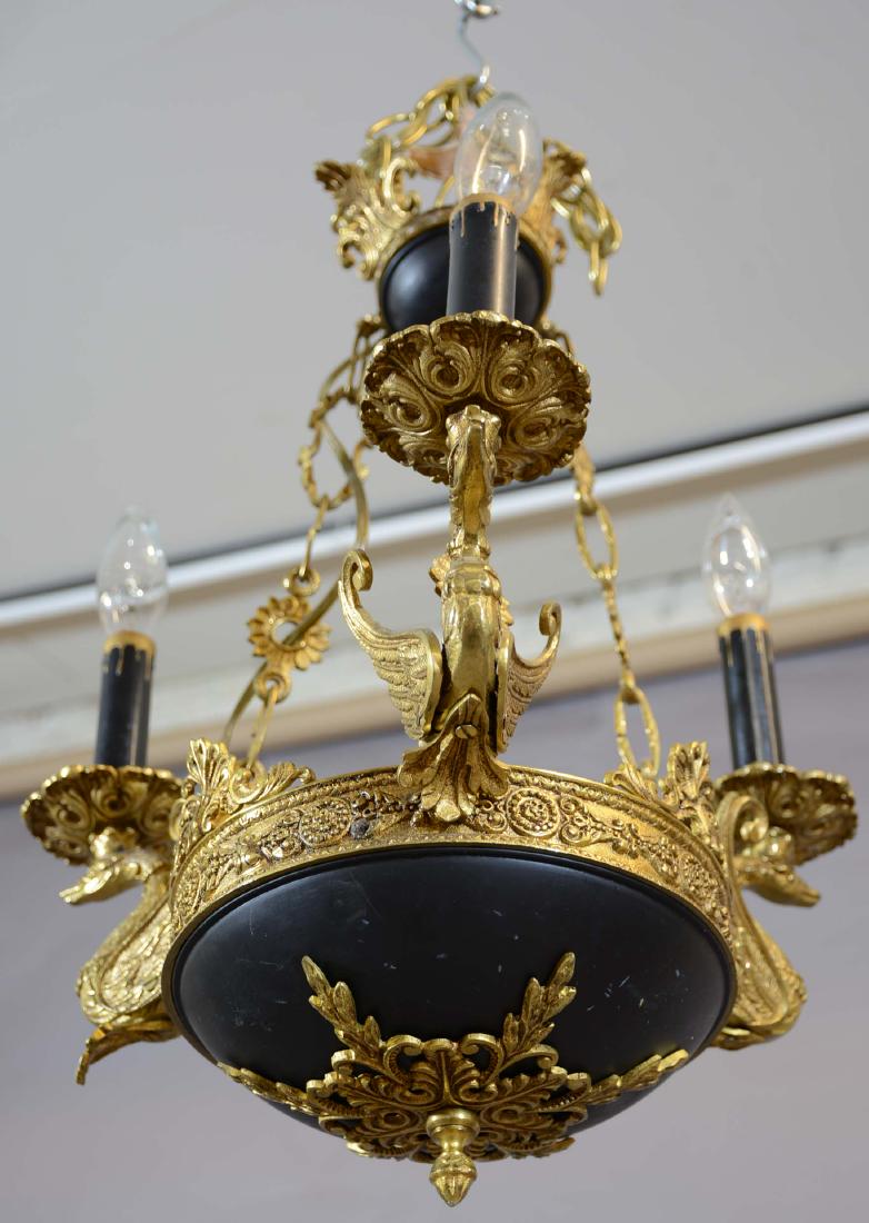 French Empire Bronze 3 Arm Chandelier: Swans holding up lights Dimensions: 19"t x 14"w Date: Ca. 1920
