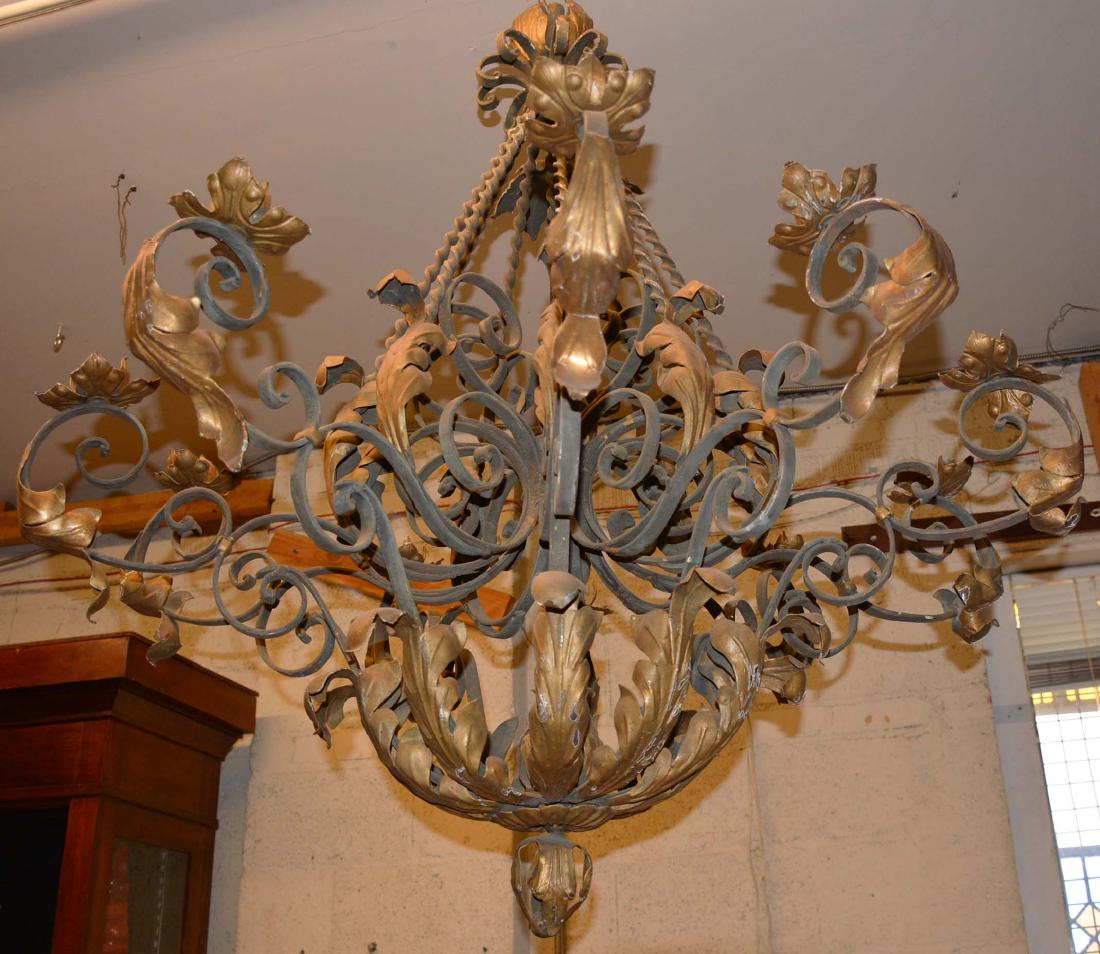 French Provincial Louis XV Style Chandelier: Wrought iron, six arms Dimensions: 45"t x 2"w Date: Ca. 1920