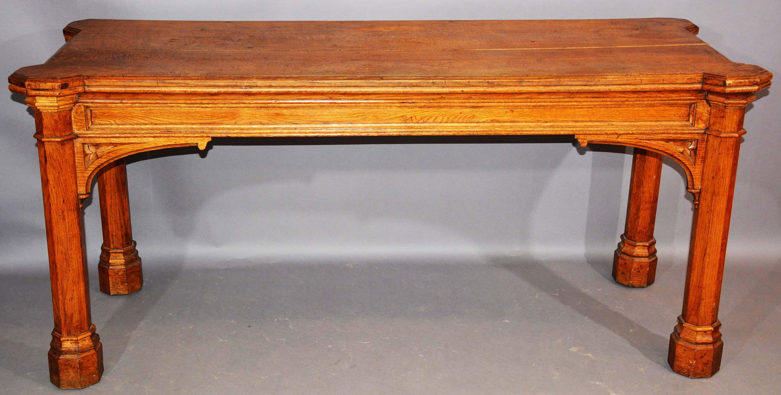 Gothic Revival Oak Sideboard: Carved skirt and octogon shaped legs Date:ca. 1880 31"T.27"D.68"W.
