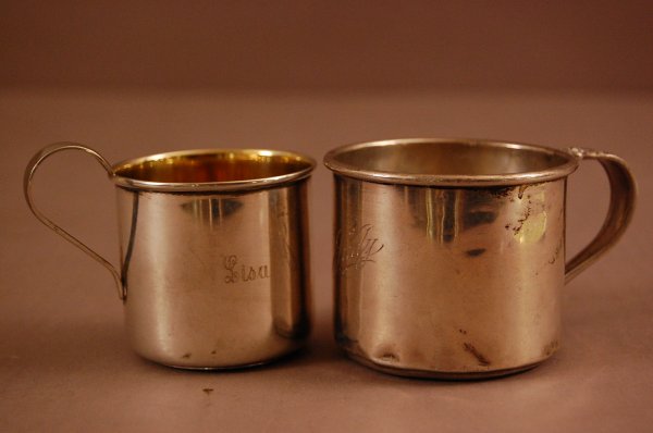 2 Sterling Silver Christening Cups. One with Gilt I: 2 Sterling Silver Christening Cups. One with Gilt Interior "Lisa" the other is marked "Judy" 2" T ca. 1920