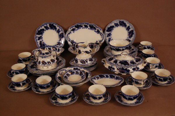 Johnson Brothers Flow Blue Dinner Set, 62 Pieces: Johnson Brothers Flow Blue Dinner Set, 62 Pieces in Normandy Pattern. Ca. 1890