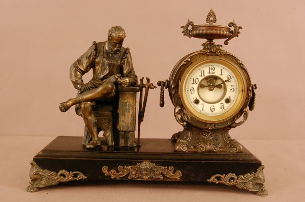 Figural New Haven Mantel Clock, Porcelain Dial, Op: Figural New Haven Mantel Clock, Porcelain Dial, Open Escapement, Time & Strike. 16"T x 19"L x 4 1/2"D ca. 1890