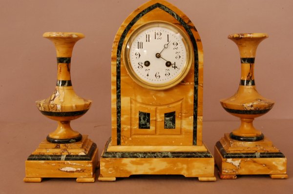 French Art Deco 3 Piece Marble Clock Set. Porcelai: French Art Deco 3 Piece Marble Clock Set. Porcelain Dial, Bronze bezel, inlaid marble face & sides. Matching urns. Movement signed: R Bonnett & R Porrien, Paris. Clock is 13"h x 8"w x 5"d; Urns are 10