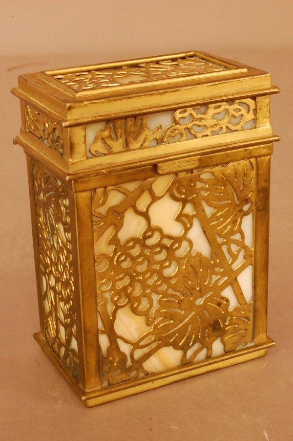 Tiffany Studios, Bronze overlay covered desk box. : Tiffany Studios, Bronze overlay covered desk box. Pattern # 876, signed on base. 4 1/2"t x 3"w x 2"d ca. 1910