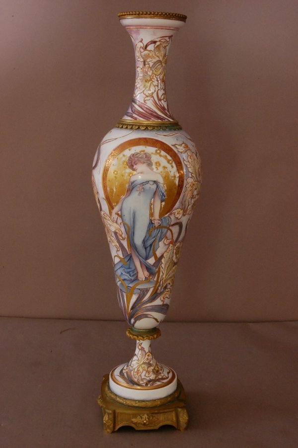Seves Art Noveau Porcelain Vase with Standing lady: Seves Art Noveau Porcelain Vase with Standing lady surrounded by flowers raised gilt decoration. Dore Bronze Base and supports. Signed on base with Seves Mark. With S center. France ca. 1900