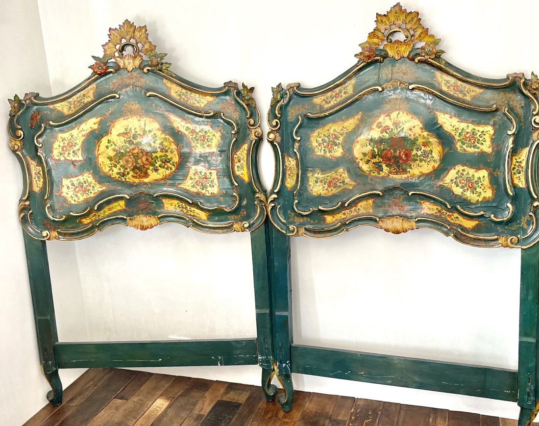 Pair of 19th Century Venetian Hand Painted Beds: Period: 19th century Origin:Venice Description: great pair of hand carved and painted twin headboards with carved crest, floradl decorated sides. 66”t41”w