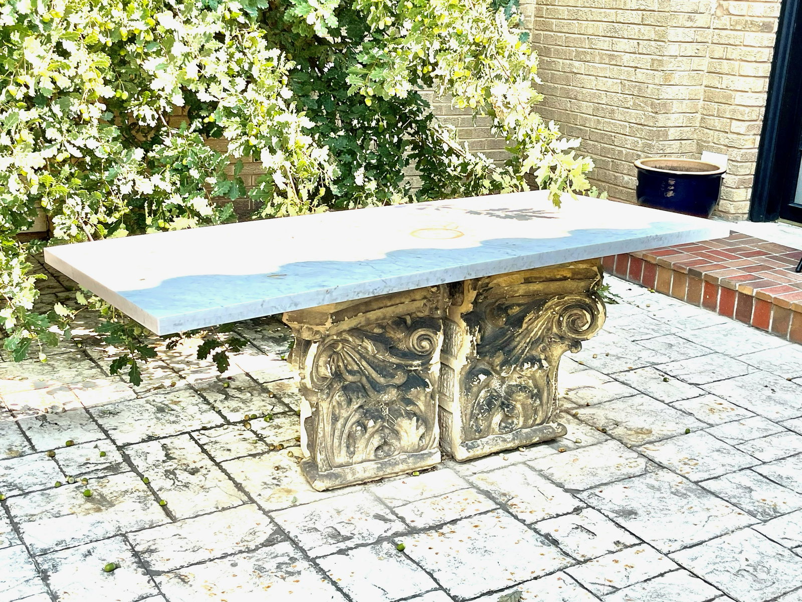 Marble Top Table Fashioned from Terra Cotta: Period: 20th century Origin: Old Building in Texas Description: fashioned from a pair of terra cotta columns. Dimensions: 29"t x 32"d x 72"w