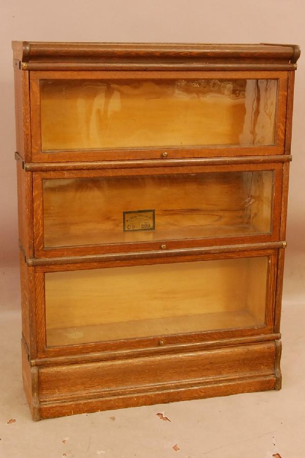 Barrister Oak bookcase: 3 Sectional Globe Werneke standing oak bookcase. 46" t x 34" w x 10 1/2"d Ca. 1900