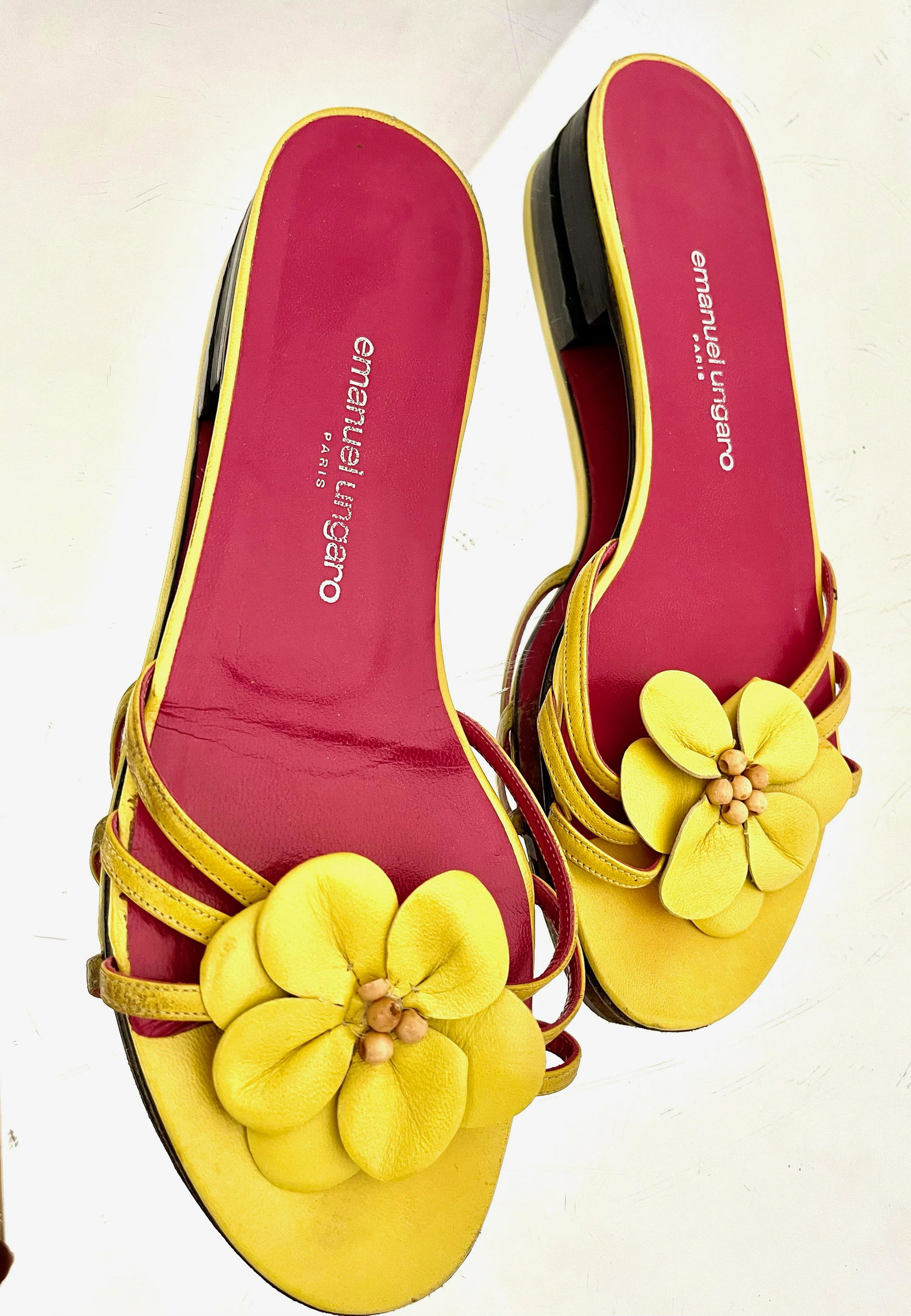 Vintage Emanuel Ungaro Yellow Mule Sandals: Vintage Emanuel Ungaro yellow mule sandals with multi-pedaled flowers at the toe.