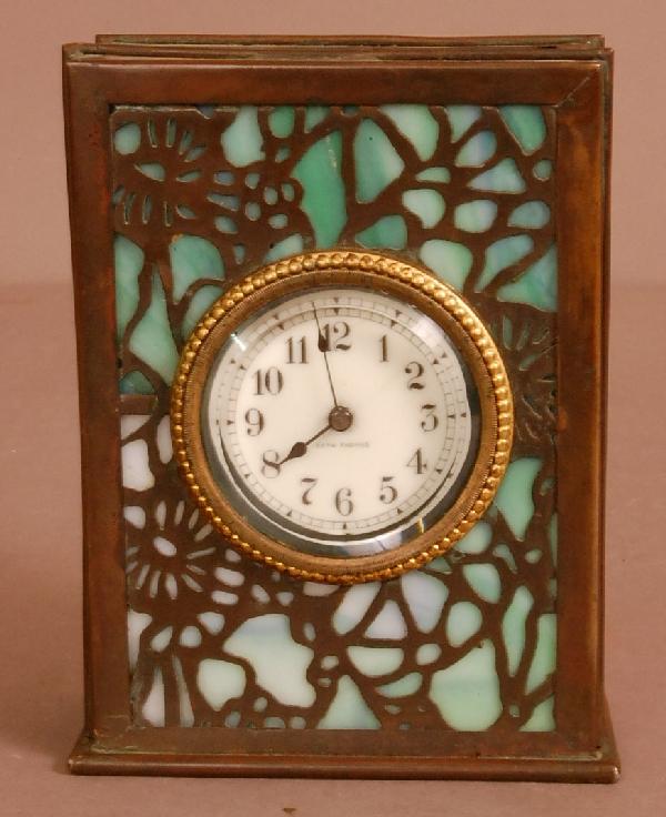 Seth Thomas Desk Clock: Seth Thomas Art Noveau style desk clock, stain glass panels on 5 sides. 5 1/2" t x 4 1/2" w x 2" d. Ca. 1920