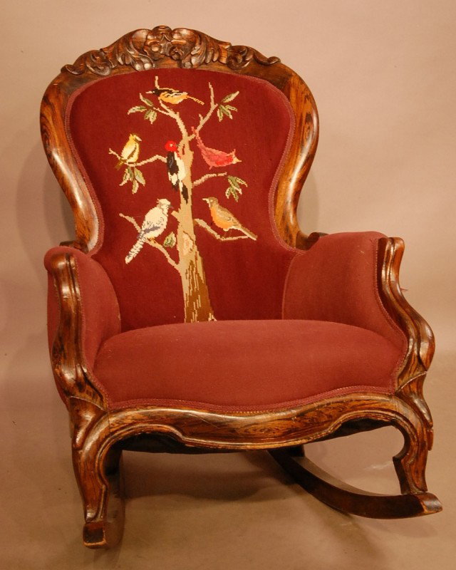 Rococo Style Victorian rocking chair with needle p: Rococo Style Victorian rocking chair with needle point of birds on back. 38" t x 28" w x 31" d Ca. 1870