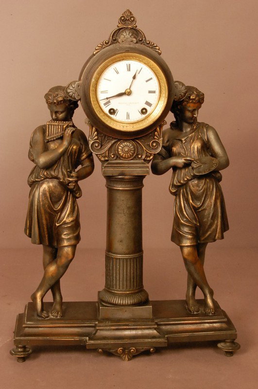 Seth Thomas Double statue clock. Patined spelter: Seth Thomas Double statue clock. Patined spelter Greek figures, Porcelain Dial, Bronze bezel. Signed Mitchell Vance & CO. N.Y. Works signed Seth Thomas Sons & CO. Thomaston, Ct. R. Kaiser. Ca. 1880