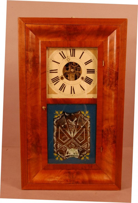 Early Jerome Shelf clock. 2 weight movement. Oge: Early Jerome Shelf clock. 2 weight movement. Ogee walnut case. 29" t x 9 1/2" w x 3 1/2" d Ca. 1830.