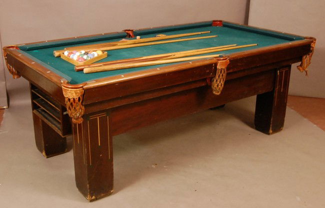 Brunswick Blake Calendar Baby Grand pool table com: Brunswick Blake Calendar Baby Grand pool table complete with balls and cue rack. 33" t x 83" w x 45" d Ca. 1910