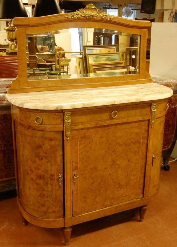 French Louis XVI style Marble Top Serving Cabinet w: French Louis XVI style Marble Top Serving Cabinet with bronze mounts & beveled mirror. 48" w x 18" d x 64" t. Ca. 1900