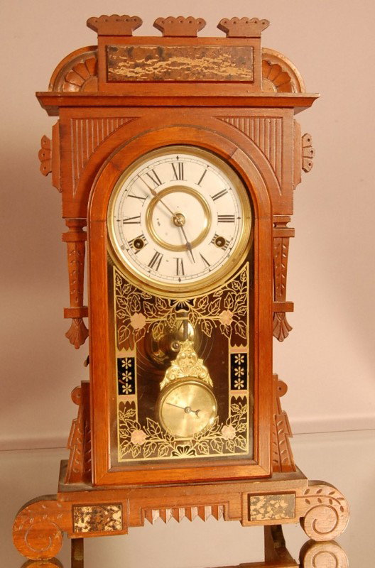New Haven Walnut Shelf Clock. Antique Stencil Gla: New Haven Walnut Shelf Clock. Antique Stencil Glass Door. Time & Strike 20" t x 13" w x 4" d Ca. 1890