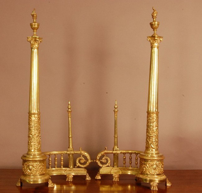 Pair of French Louis XVI style bronze andirons. 3: Pair of French Louis XVI style bronze andirons. 32" t x 12" w x 12" d Ca. 1910