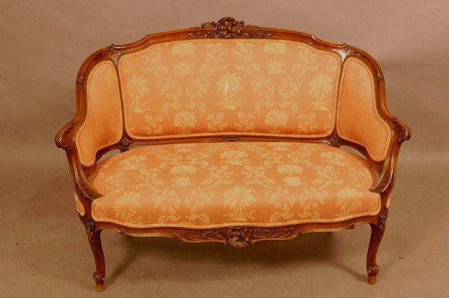 French Louis XV style Walnut Loveseat with shell ca: French Louis XV style Walnut Loveseat with shell carved crest, curved & shaped sides, matching shell carving on front apron on 4 cabriole legs. 34" t x 24" d x 36" w Ca. 1880