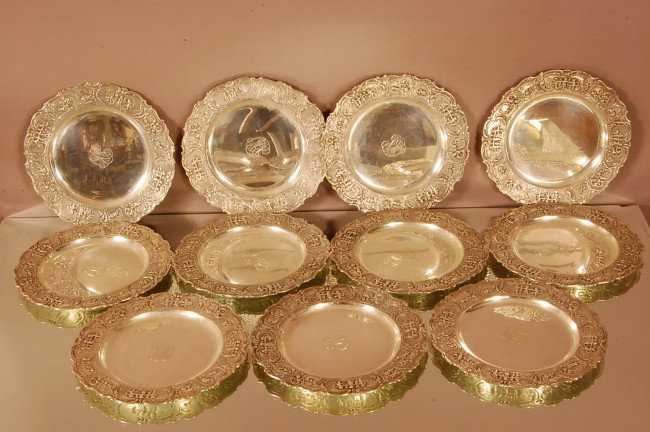10 Sterling Silver Plated decorated with children : 10 Sterling Silver Plated decorated with children playing and floral design. Signed by Marshall Field & CO. Appprx. 64 troy oz. Sterling