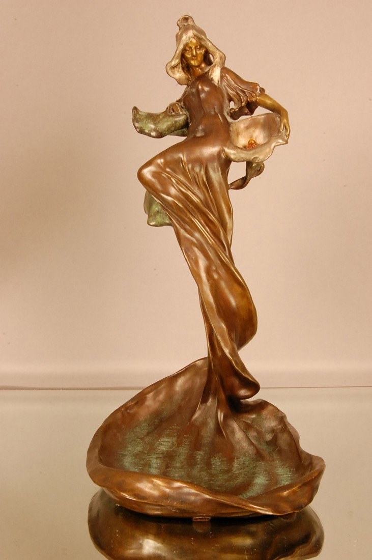 Raoul Larche French Art Noveau Bronze Statue of Wo: Raoul Larche French Art Noveau Bronze Statue of Woman standing on lily pad. 15" t x 9" d x 8" w Ca. 1910