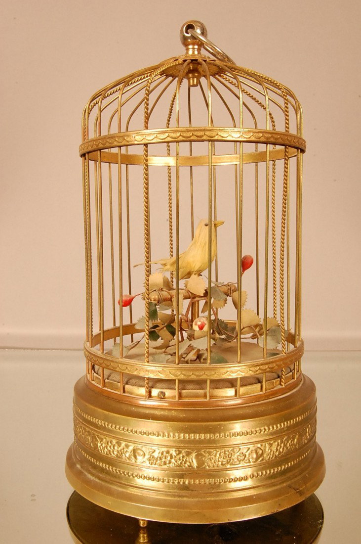 Single Animated Mechanical Singing Bird in brass : Single Animated Mechanical Singing Bird in brass Cage. 12" t x 6" d
