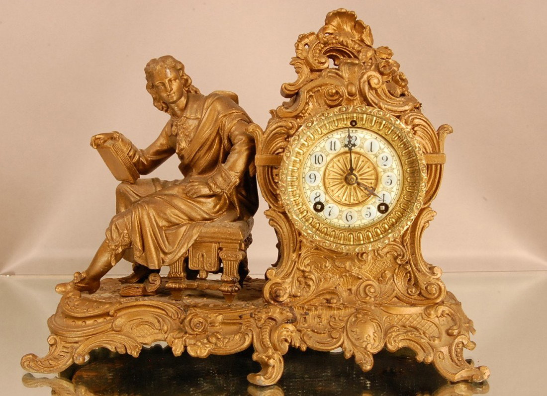 Ansonia Figural Mantel Louis XV style clock: Original decorated porcelain dial. Time & strike. Signed on dial & clock works. 11" t x 14" w Ca. 1880