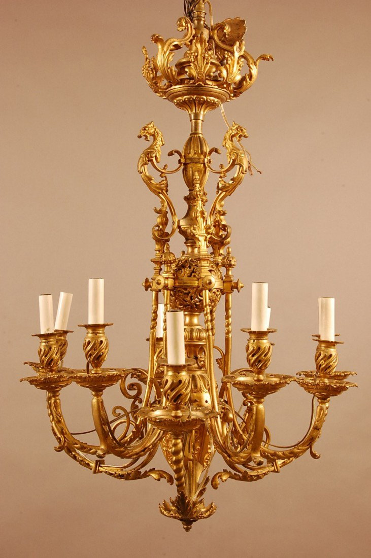 Victorian 9 Arm Dore Bronze Chandelier: 3 standing Gargoyles in top, excellent detail in bronze work. Some losses. 26" w x 36" t Ca. 1870