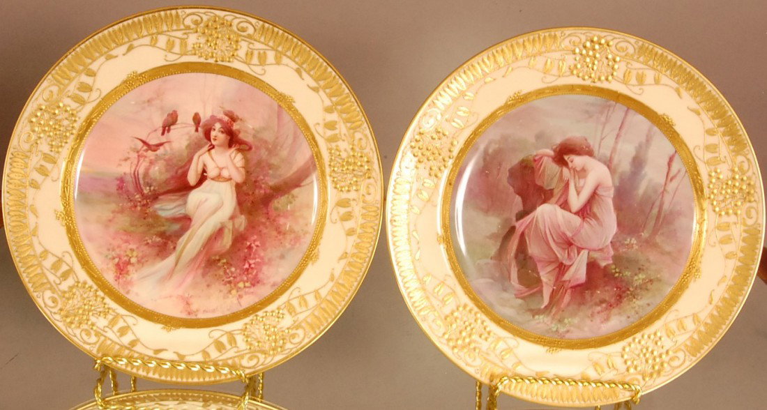 Minton Decorated Plates: "Night & Dawn" 2 with Raised Gilted trim of Grape & Leaves. Both pieces have been repaired. Artist signed. H. Vosek Ca. 1895 10 1/4" d Ca. 1895