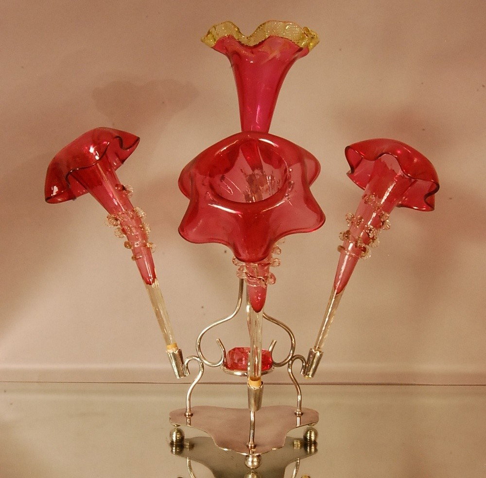 Victorian style Cranberry Epergne: On silver plate holder. 16" t Ca. 1900
