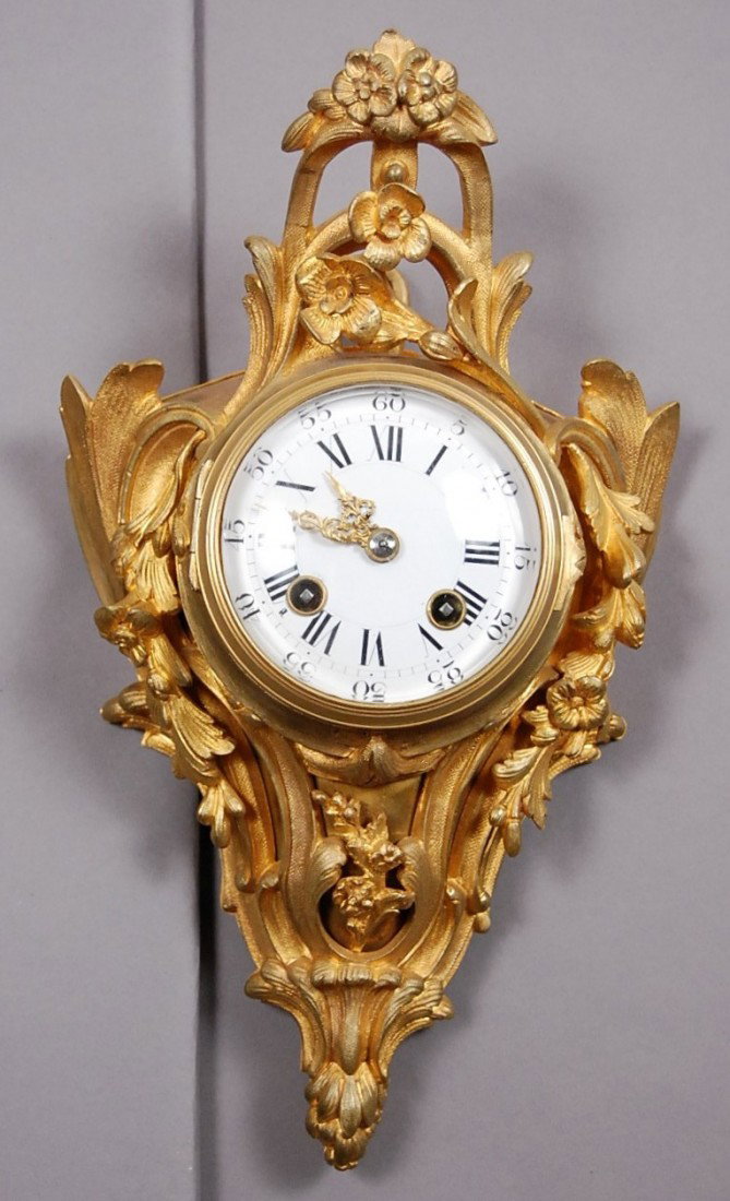 Louis XV style French Dore Bronze Cartel Clock: 7" w x 12" t x 3 1/2" d Ca. 1890