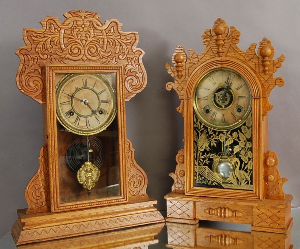 2 Oak Mantel Clocks: Gilbert & Waterbury with parital labels. Ca. 1900