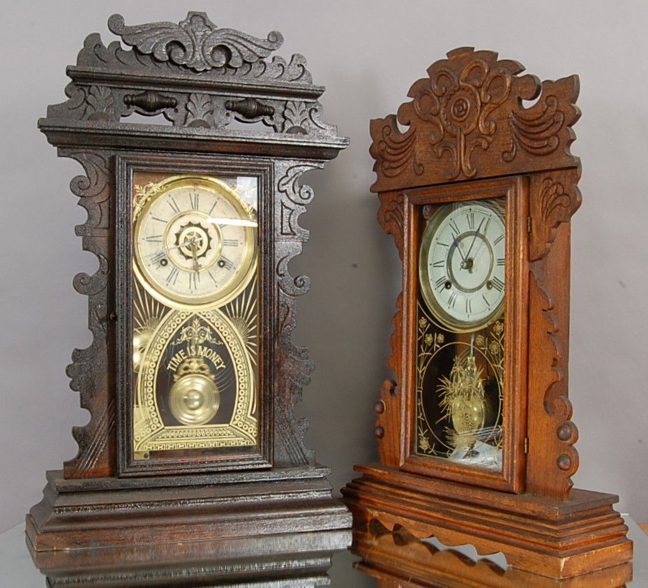 2 Oak Mantel Clocks: Attleboro with alarm 24" t; New Haven 23" t. Time & Strike. Ca. 1900