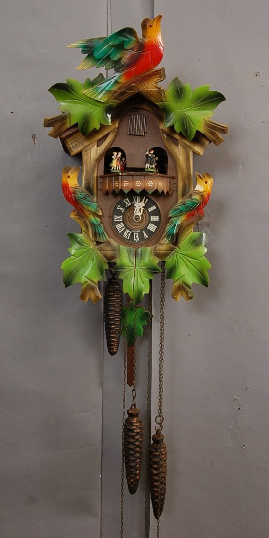 German Coo Coo Clock: with Swiss Music Box. 3 Weight movements. 27" t x 10" w. Ca. 1910