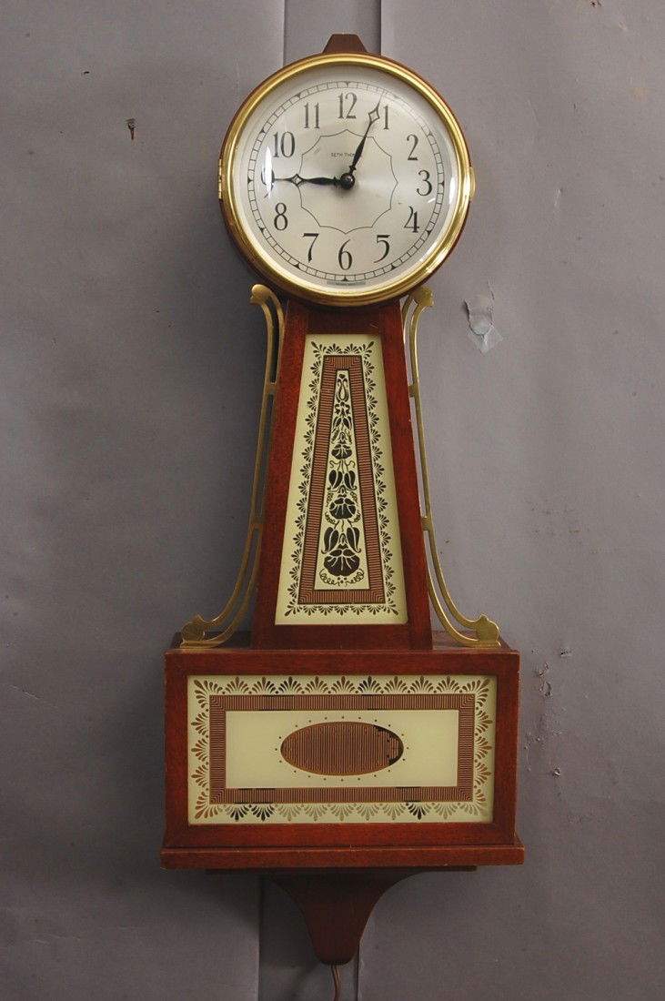 Seth Thomas Banjo Clock: Mahogany Case, Electric movement. 27" t. Ca. 1950