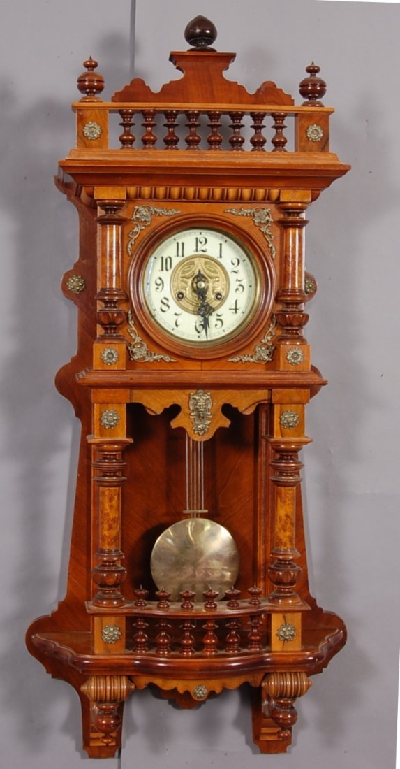 German Walnut Junghan Regulator Wall Clock: Porcelain Dial, time & strike. Marked Junghans on mount 45" l x 16" w. Ca. 1890