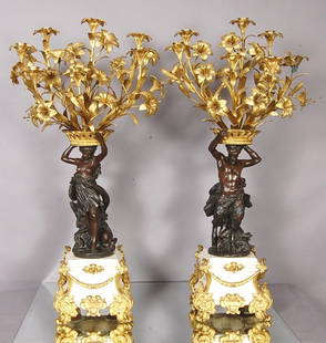 French Louis XV Bronze Candelabras with Greek Gods: Statue holding up 7 arm candelabras on marble base. 34" t ax 18" w x 12" d. Ca. 1860