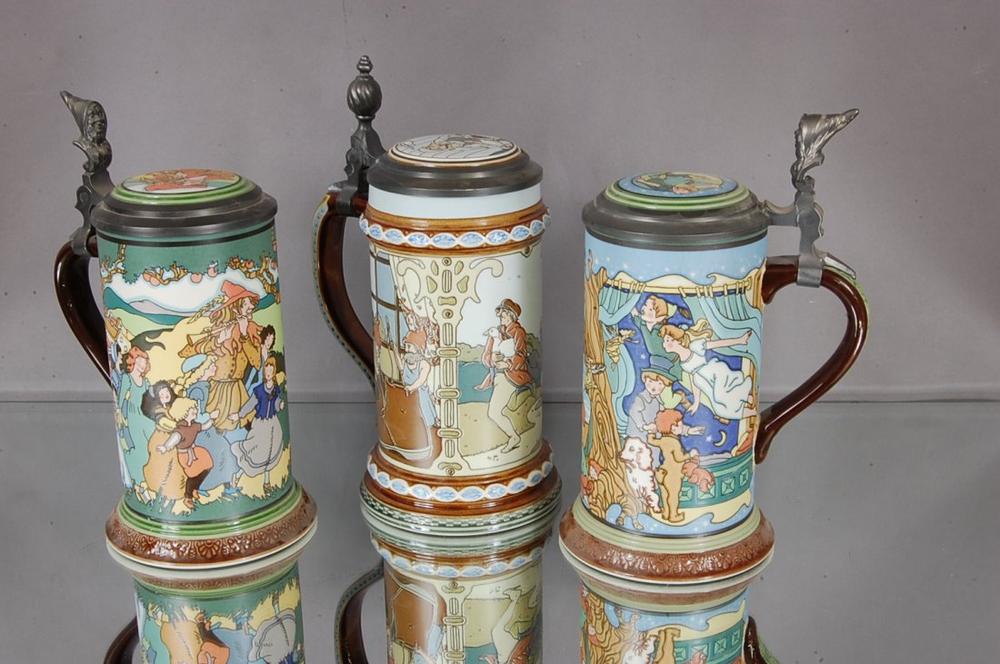 3 Mettlach Steins Hand Painted: Peter Pan, Pied Piper of Hamelin, Cinderella. 9" t. Signed & numbered. Mettlach, Viloory & Boch. Ca. 1970
