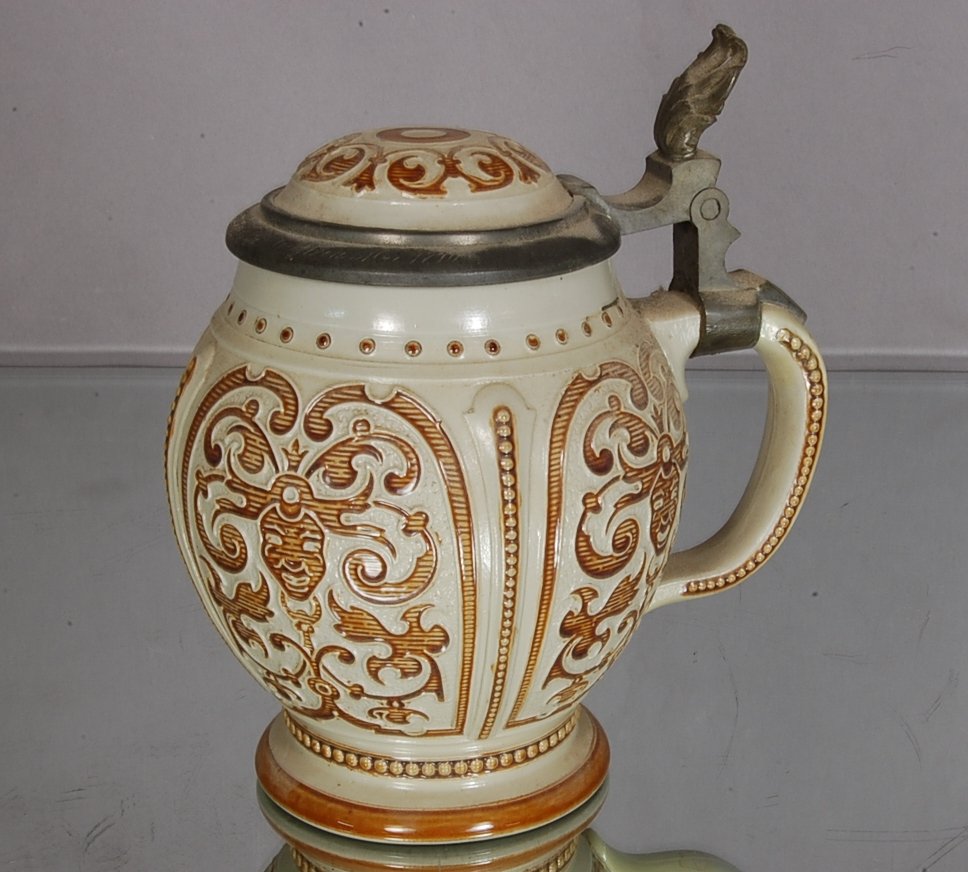 Mettlach 1/2 Liter: Bulbous pedestal type stein 6" t. Signed on bottom. Ca. 1890 Dr. Haefeli estate