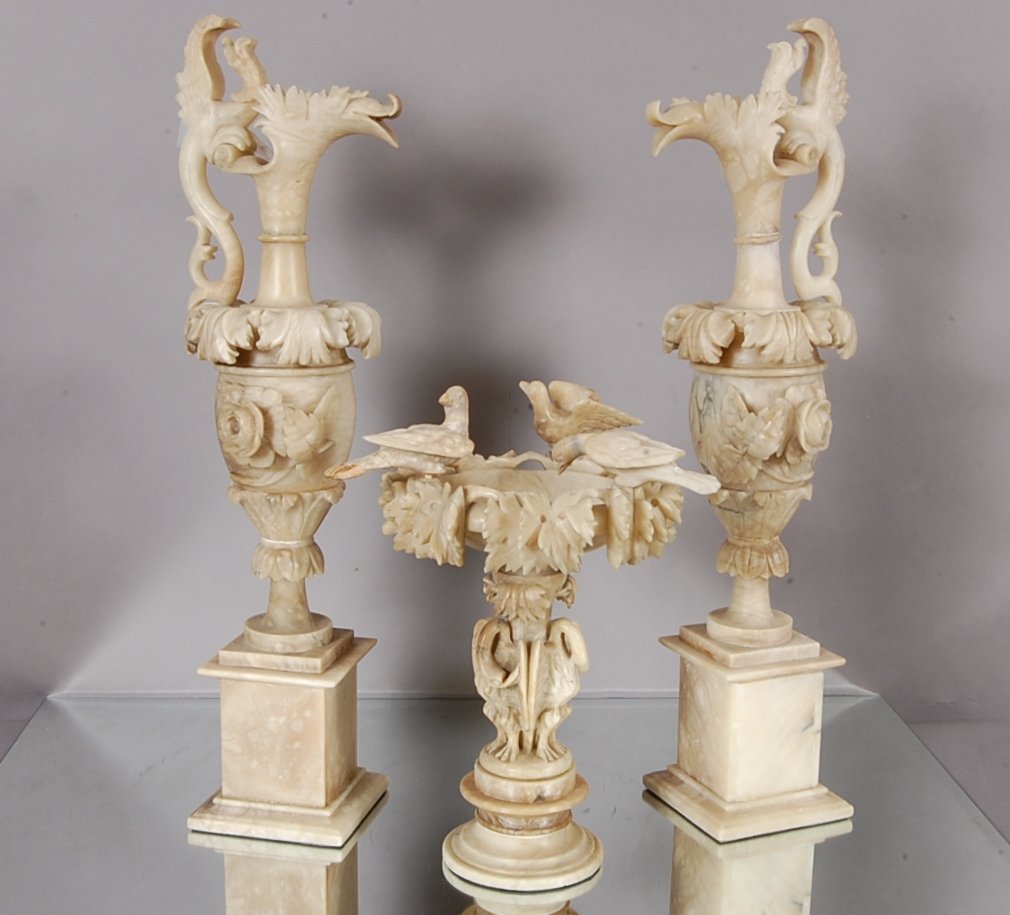 3 pc. Victorian alabaster decorated set: with 2 carved ewers and center bowl with flowers & birds. Some losses & repairs. Ewer 24" t, bowl 13" t. Ca. 1880