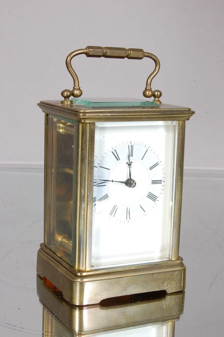 Seth Thomas Carriage Clock: 2 Color Porcelain Dial, Beveled Glass on all sides. 6i" t x 3" w x 3" d. Signed on back Seth Thomas. Ca. 1890